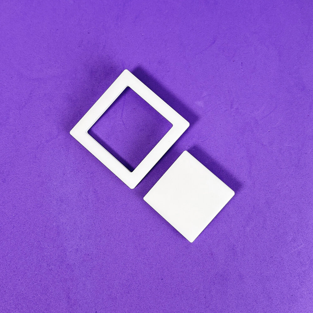 PienoVuoto Rombo – Orecchini Asimmetrici in Plexiglas